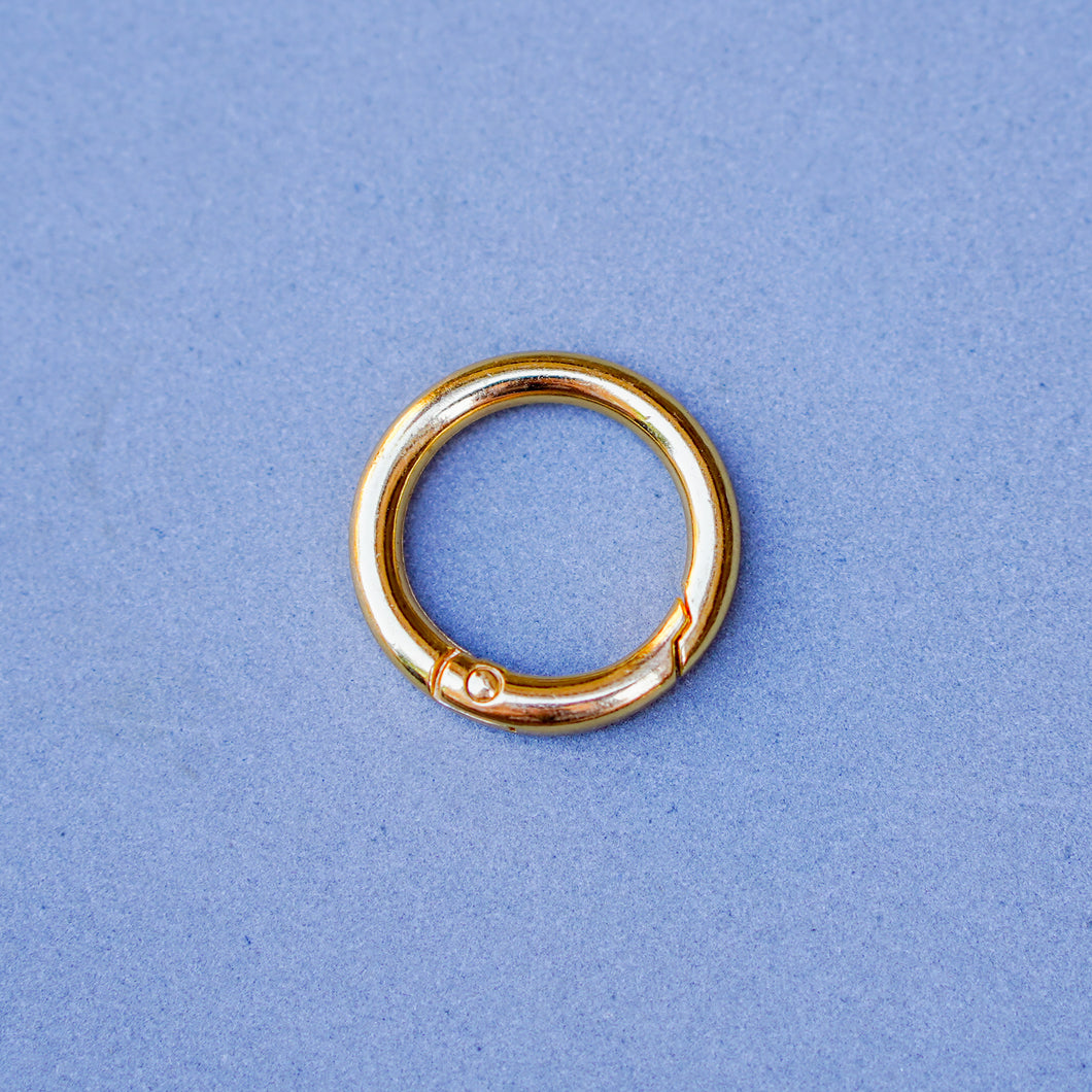 Gold circle carabiner